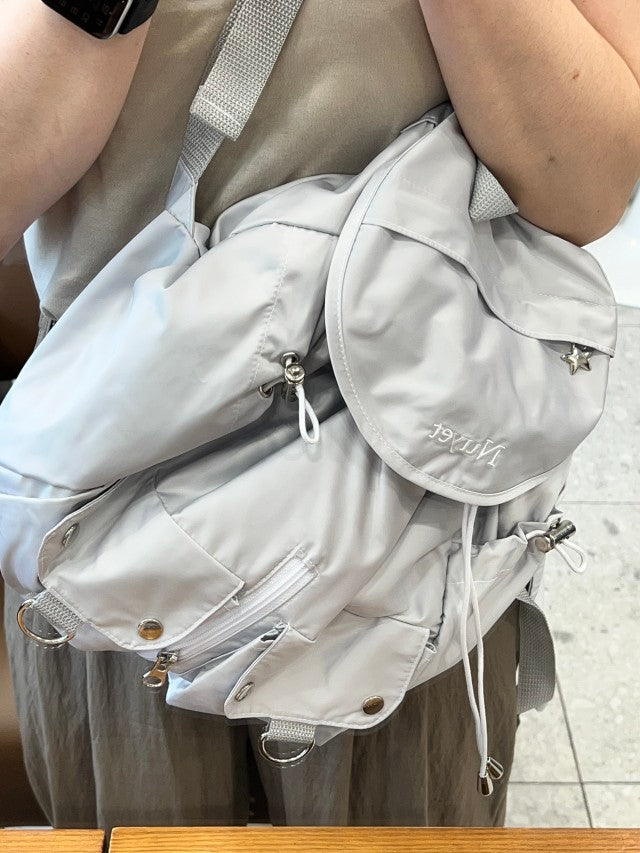 Nuyet - Grey round pocket backpack