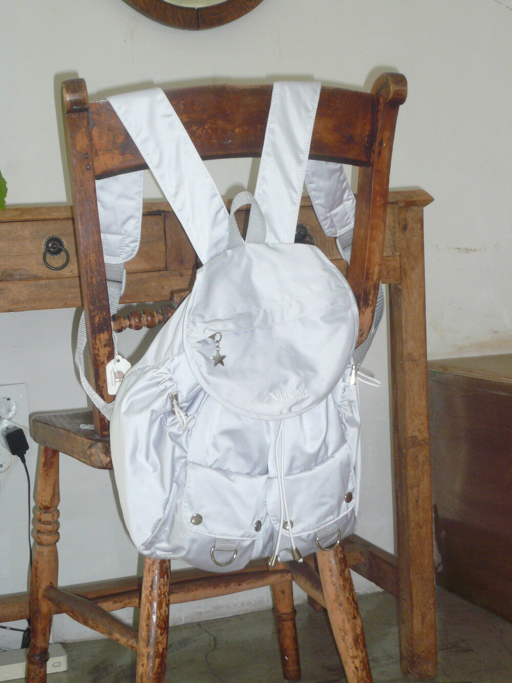 Nuyet - Grey round pocket backpack