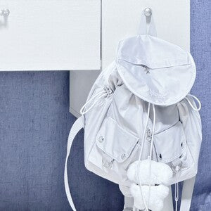 Nuyet - Grey round pocket backpack