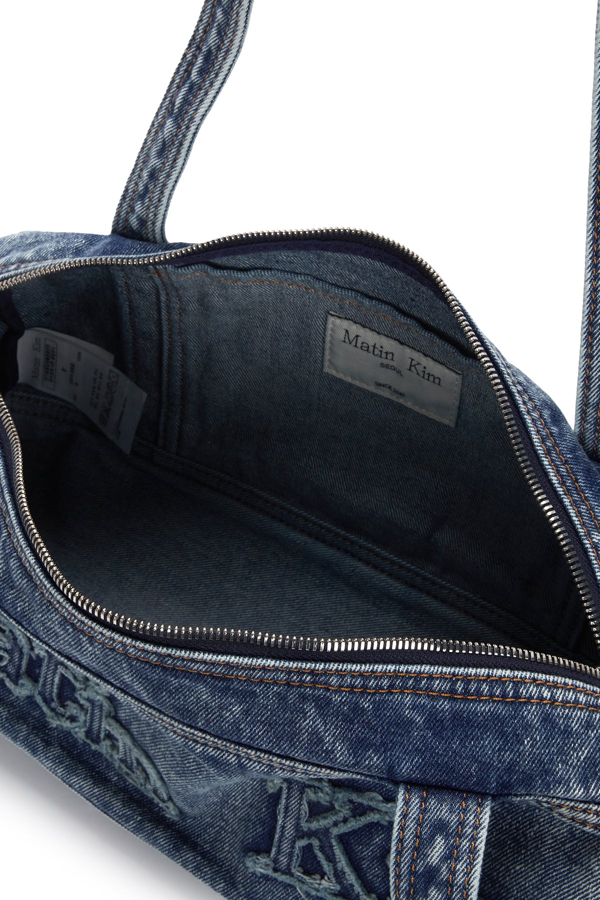 LOGO WASHED DENIM DUFFEL BAG IN BLUE